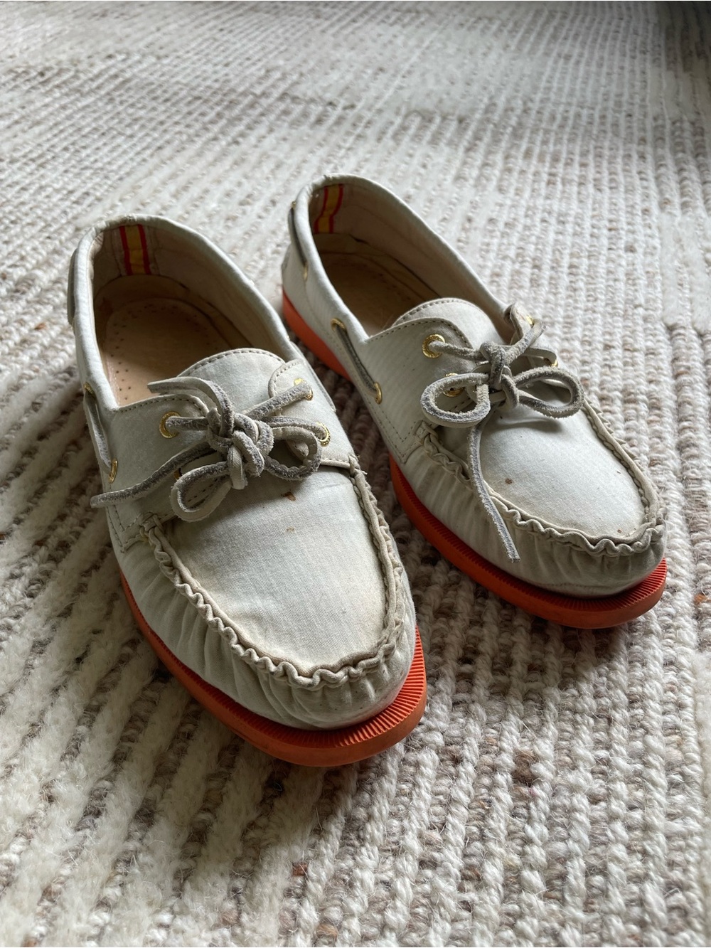 Sperry Off-White Canvas Boat Shoes with Orange Soles